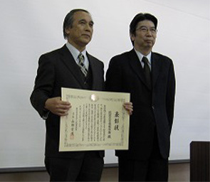山口情報科学類長受賞風景